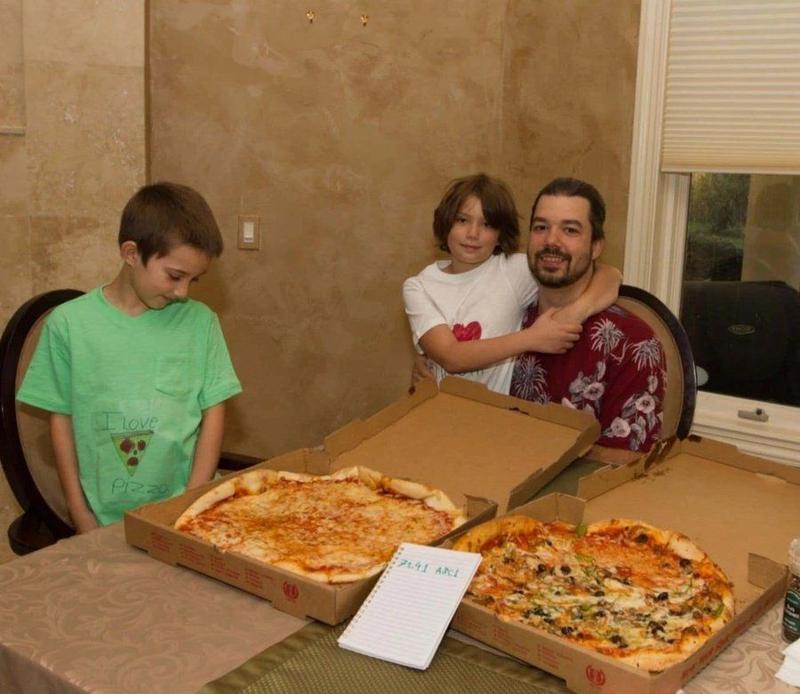 Laszlo Hanyecz with pizzas