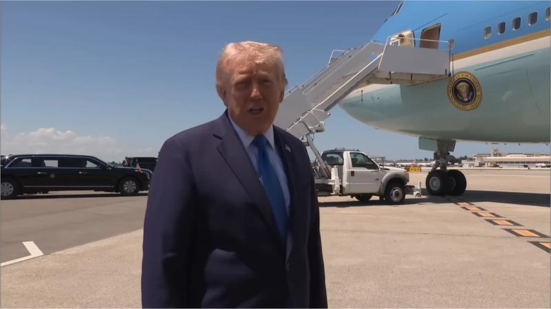 Donald Trump speaking to reporters